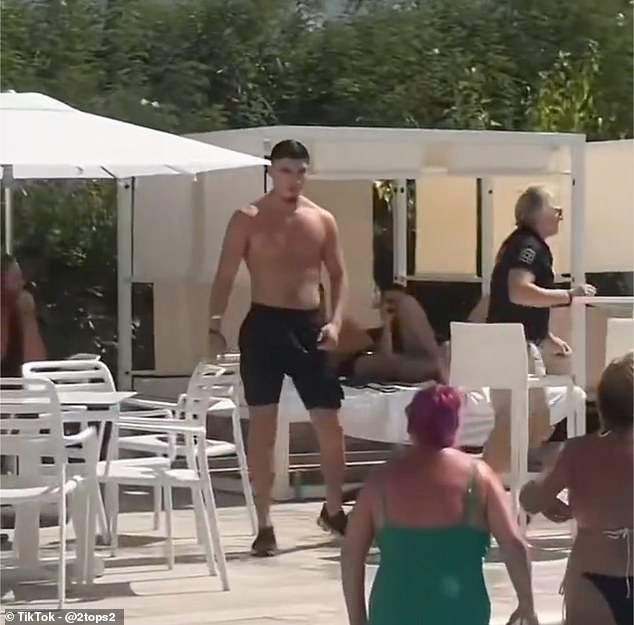 Oldham striker Kian Harratt was filmed launching a chair in the direction of a woman at an Ibiza resort