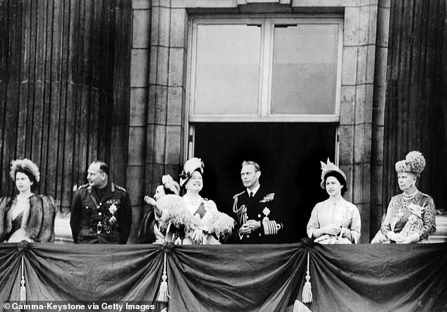 The Royal Family wave from the balcony of Buckingham Palace during King George VI and Queen Elizabeth's silver wedding anniversary. The royal fans were somewhat over-enthusiastic and cheered the royals to come out nine times