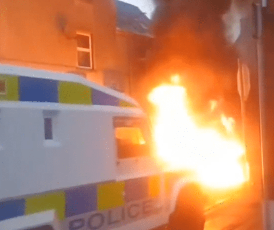 Police van on fire.