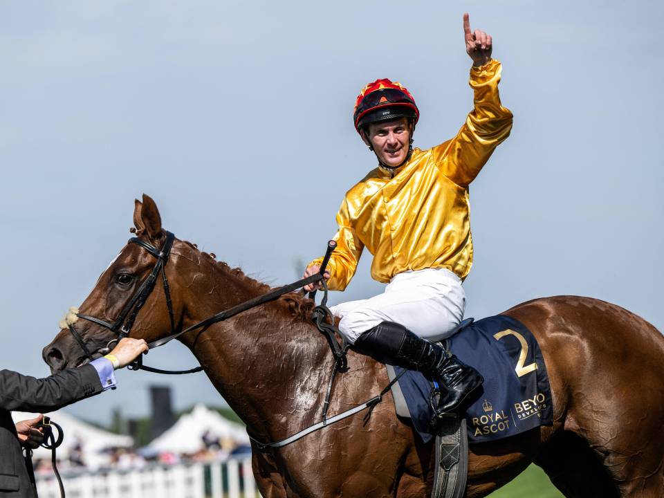 Jockey Gary Carroll celebrates winning the Coronation Stakes at Royal Ascot.
