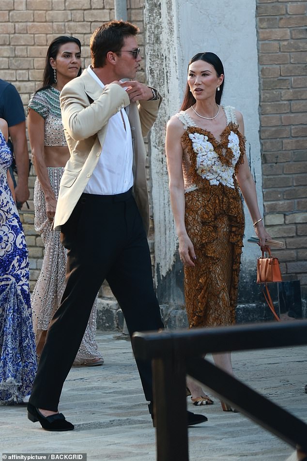 Tom Brady chatted away to one of billionaire Rupert Murdoch's glamorous ex-wives during Jeff Bezos and Lauren Sanchez's wedding festivities this week
