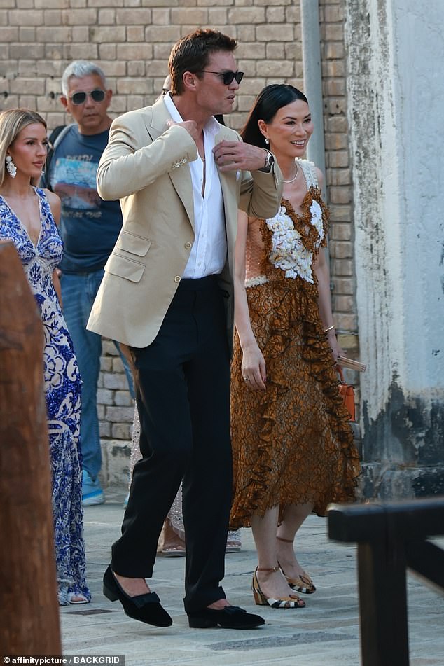 On Thursday, Brady, 47, was seen making his way to the couple's starry pre-wedding soiree in Venice, Italy with Wendi Murdoch, 56, by his side