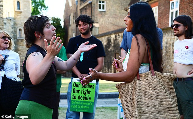 Protesters outside Parliament yesterday after MPs voted to allow late-stage abortions in one of the biggest overhauls for half a century
