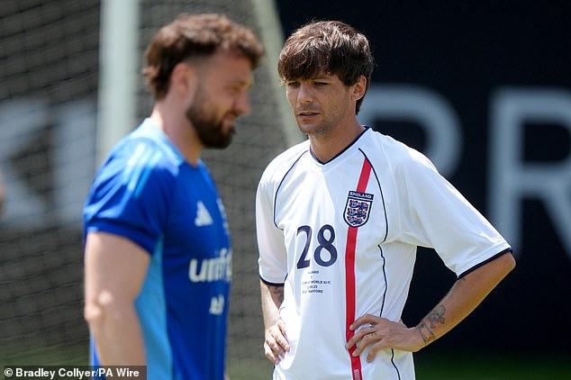 Sam and Louis (pictured) were both seen deep in thought while out on the pitch earlier today