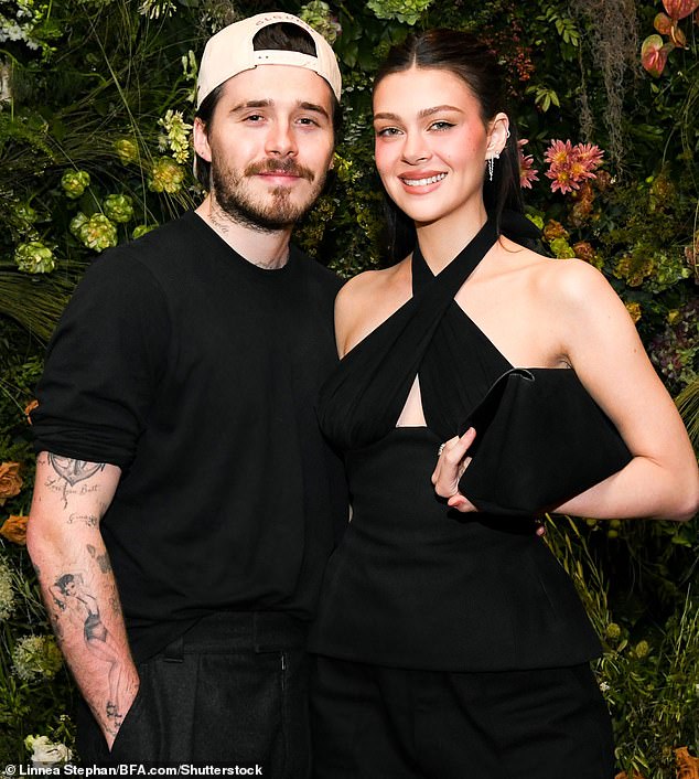 Nicola Peltz with Brooklyn Beckham in May this year