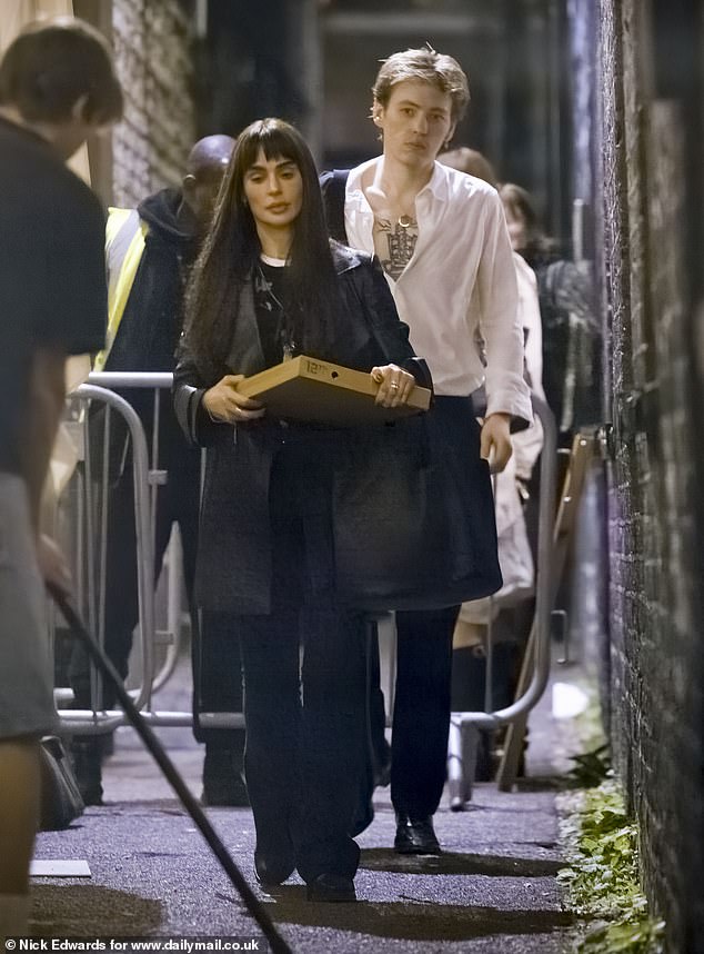 Ozzy and Sharon Osborne's eldest daughter Aimee is believed to have grown close to the lead singer of US rock band Brigitte Calls Me Baby, Wes Leavins. Pictured: Wes Leavins and Aimee Osbourne leaving the Sebright Arms pub in Hackney, London