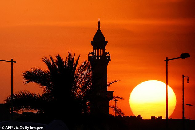 The US Embassy in Qatar (Doha is pictured) has ordered Americans in the nation to 'shelter in place' as fears grow of an Iranian retaliation to the US strikes on Saturday night