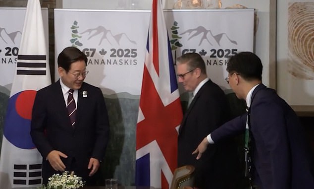 Sir Keir Starmer is seen with the South Korean president and his translator at the G7
