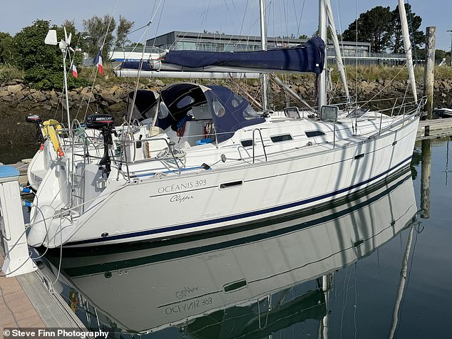 17 Albanian migrants, including one woman, hoping to slip illegally into Britain were found hiding inside the cabin of a luxury yacht named Tacoma (pictured)