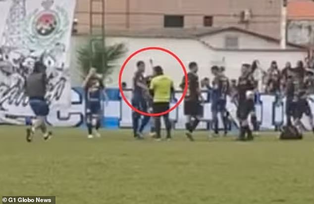 Ederson da Carlos Silva was seen issuing a player a yellow card as police ran onto the field and arrested him on Sunday in Guarujá, Brazil