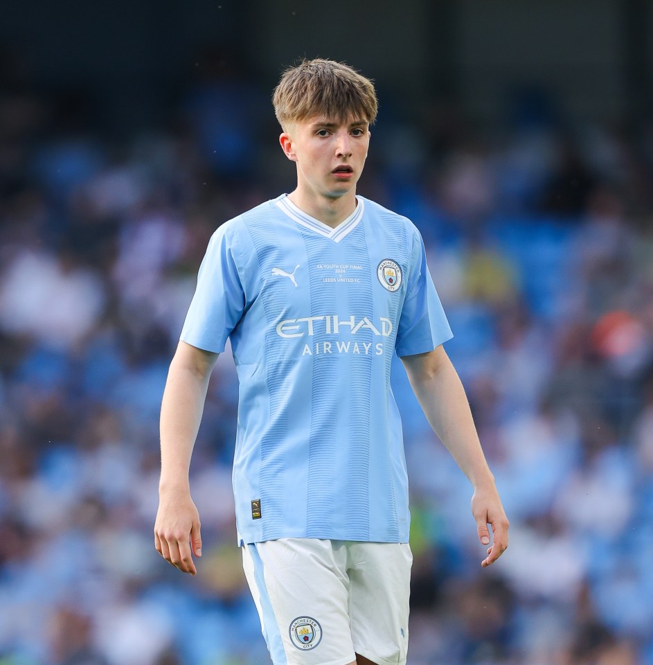 Charlie Gray of Manchester City in a soccer uniform.