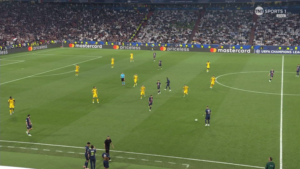 Soccer players on a field during a game.