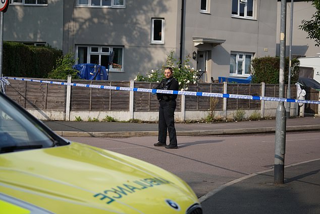Officers and paramedics rushed to the scene on Nevin Road in New Moston, Oldham, today with a large police cordon now in place