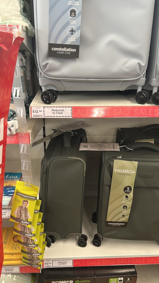 Three suitcases on sale.