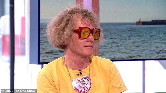 The One Show fans were surprised when they spotted a VERY crude message on Grayson Perry's (pictured) necklace