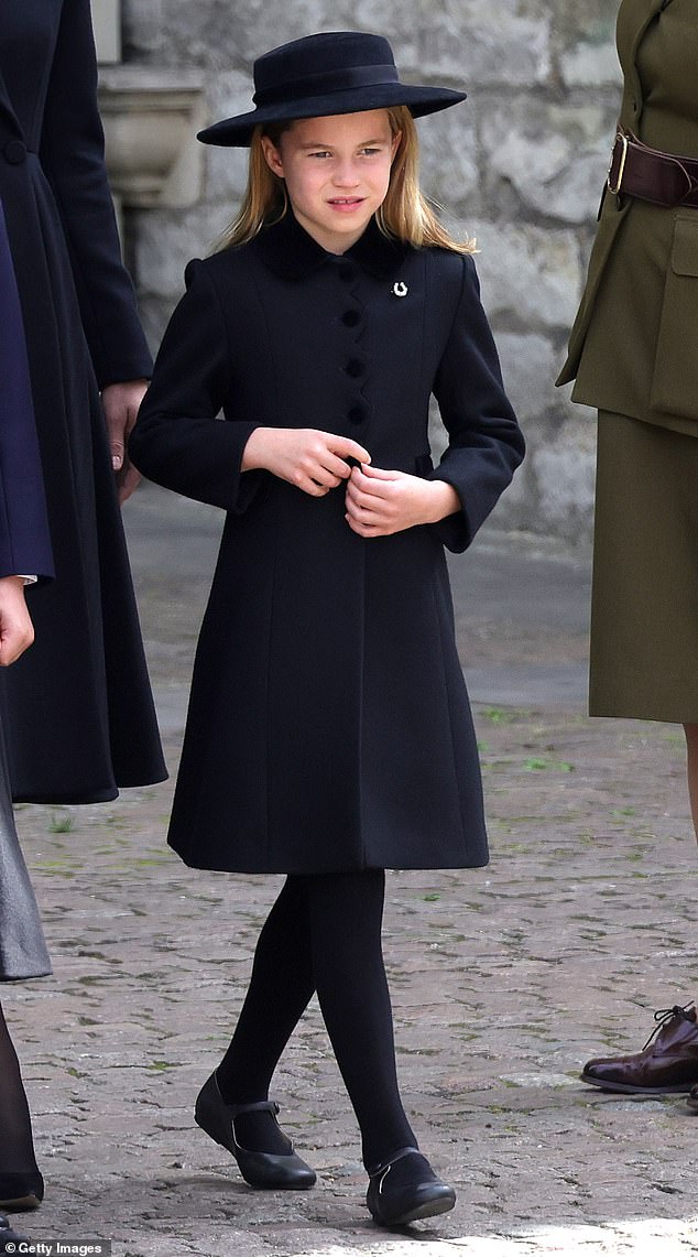 The young royal, 10, pinned the historic Diamond Horseshoe brooch to the front of her light blue dress for her grandfather King Charles' birthday parade today - with Charlotte first wearing the piece of jewellery to Queen Elizabeth's funeral in 2022