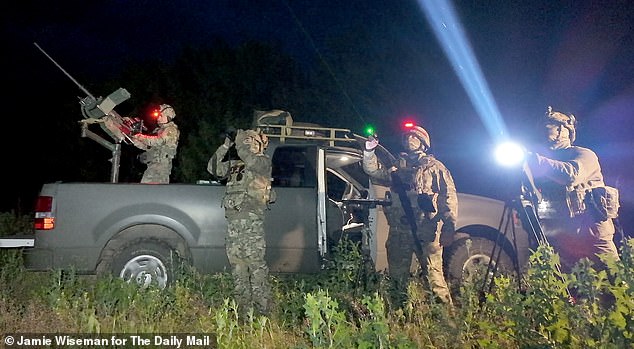Territorial Community Volunteer Formation 24' out with their search light and AA Guns, searching the skies outside Kyiv for Russian kamikaze drones