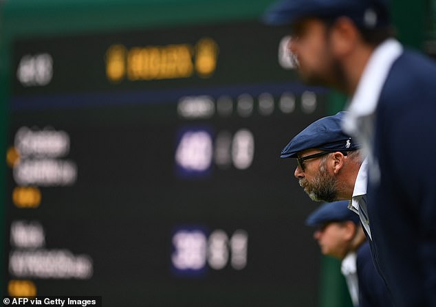 Line judges have previously been crucial in overseeing matches at the annual Wimbledon tennis tournament - including these pictured here at the 2022 event