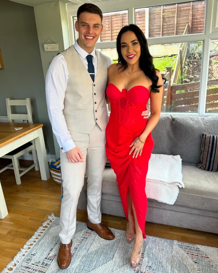 Stephanie Davis and Joseph McKalroy posing for a photo.
