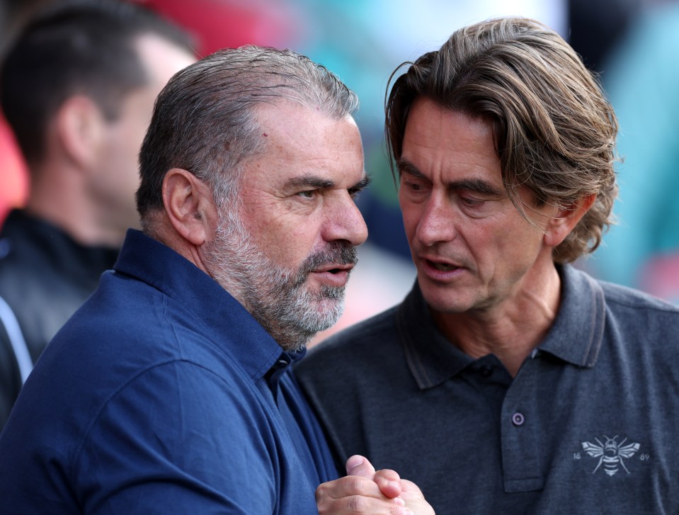 Ange Postecoglou and Thomas Frank, managers, talking.