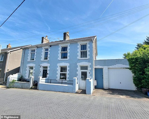 At first glance, this home in Bridgend seems like a typical detached property, boasting three floors and a garage on the side