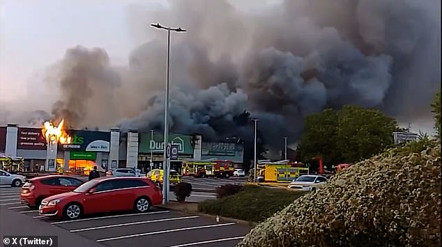 The flames broke out inside the Dunelm branch at St James Retail Park in Northampton at around 3pm yesterday