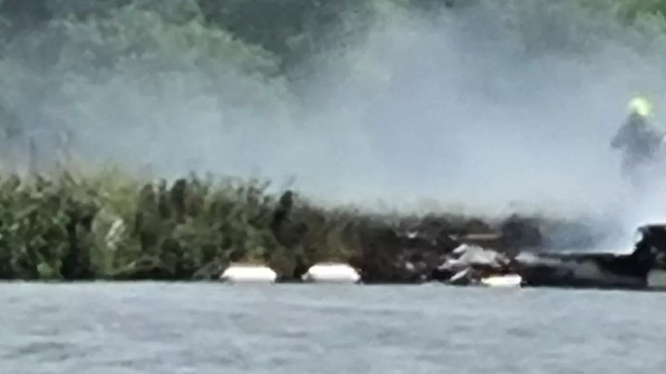Burning boat on the Thames River.