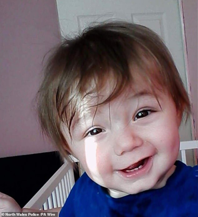 Ethan Ives-Griffiths (above) had been 'desperately ill', was in a coma and required emergency surgery after being subject to 'repeated assaults' when he was rushed to hospital, Dr Jayaratnam Jayamohan told Mold Crown Court today