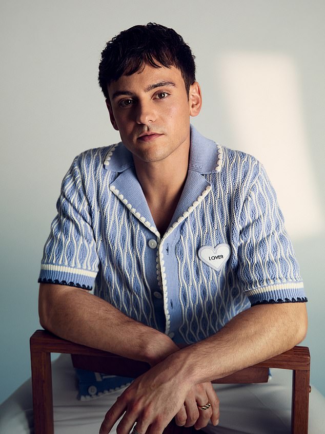 Tom Daley wearing his new collection with Reiss
