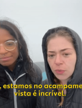 Screenshot of two women camping.
