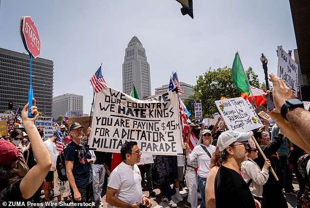 People protest in downtown Los Angeles, CA on Saturday, June 14, 202