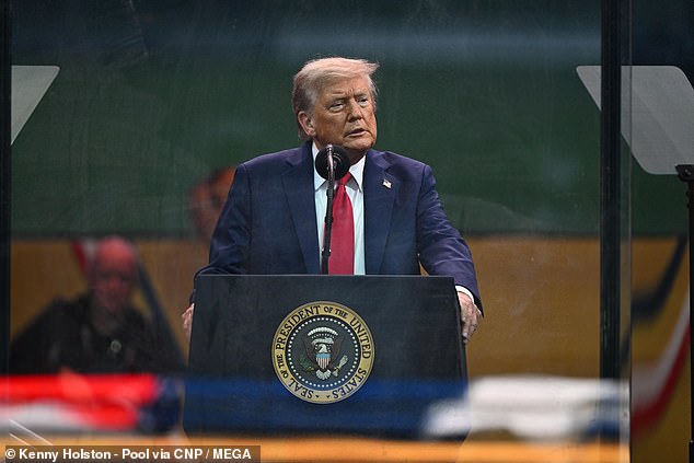 United States President Donald J. Trump reviews the scene during a parade celebrating the 250th anniversary of the U.S. Army, June 14, 2025, in Washington, DC