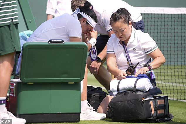 Ons Jabeur had her head in her hands as she received medical attention at Wimbledon