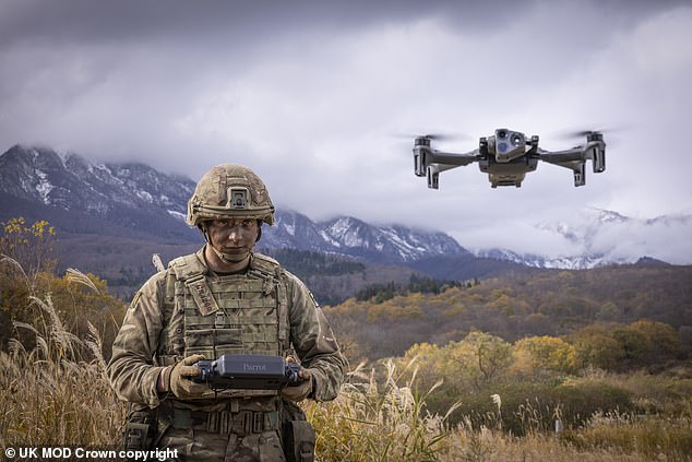 Hundreds of millions of pounds will be invested in cutting-edge drones and artificial intelligence for the military. Pictured: A soldier from the Royal Regiment of Scotland flys the Parrot Anafi drone
