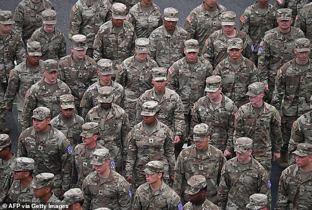 US Army Mountain division combat soldiers march during the Army 250th Anniversary Parade in Washington, DC on June 14, 2025