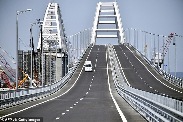 Ukraine's SBU security service said on Tuesday it had hit the road and rail bridge linking Russia and the Crimean peninsula