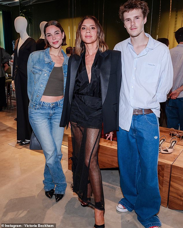 Victoria Beckham's son Cruz showed he is still supporting his mother amid the family's feud with eldest child Brooklyn, as he and his girlfriend Jackie Apostel joined her at a jewellery party
