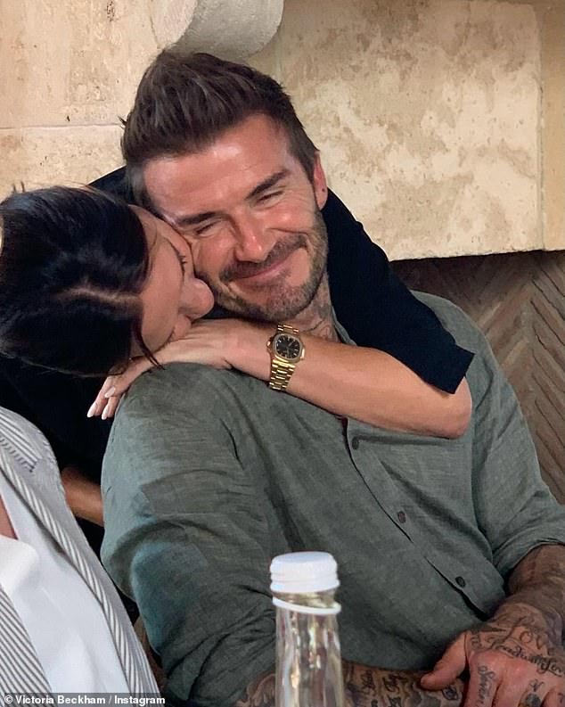 Victoria Beckham paid tribute to her 'knight in shining armour' husband David on Saturday after he was finally honoured with a knighthood