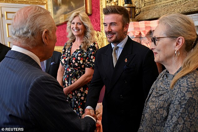 The former footballer, 50, proudly led the King's Birthday Honours list after being in the running for more than a decade