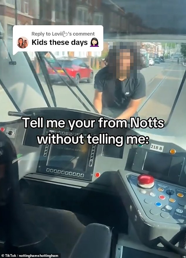 Nottingham Express Transit has issued a warning over a 'dangerous' TikTok trend which sees youngsters surfing on the side of moving trams (pictured: someone taking part in the trend)