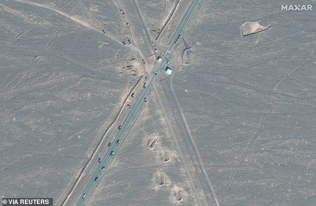 A satellite image shows new vehicle movements on the road 1.1 kilometres from the Fordow nuclear facility, near Qom, Iran