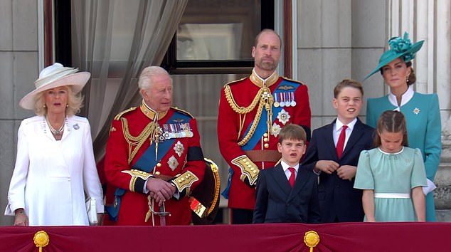 The King and Queen stand alongside William and Kate and their three children, George, 11, Charlotte, 10, and Louis, seven