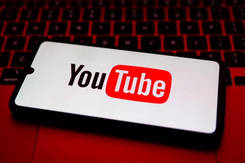 YouTube logo on a phone screen.