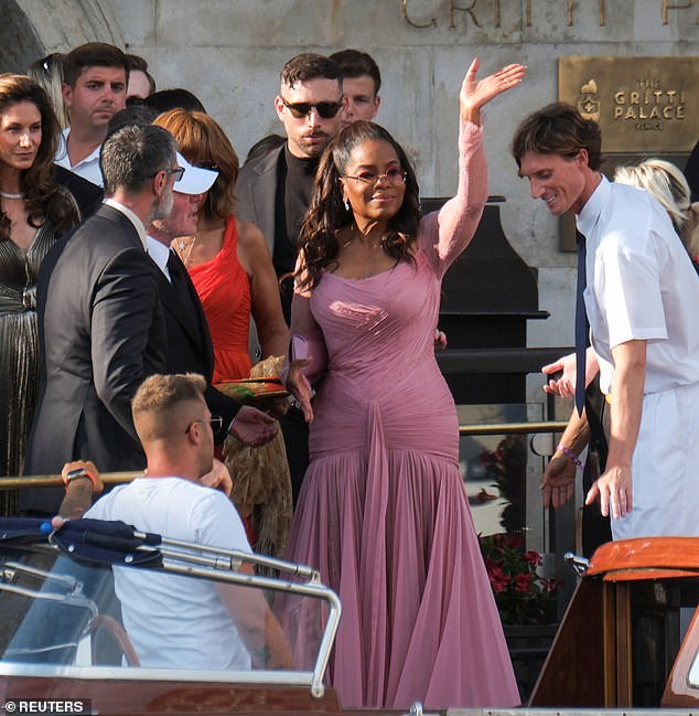 Oprah was worried about falling as she boarded the taxi boat that would take her to the luxurious $20 million wedding on Friday, also demanding that the porter let her 'wave' before she stepped on board