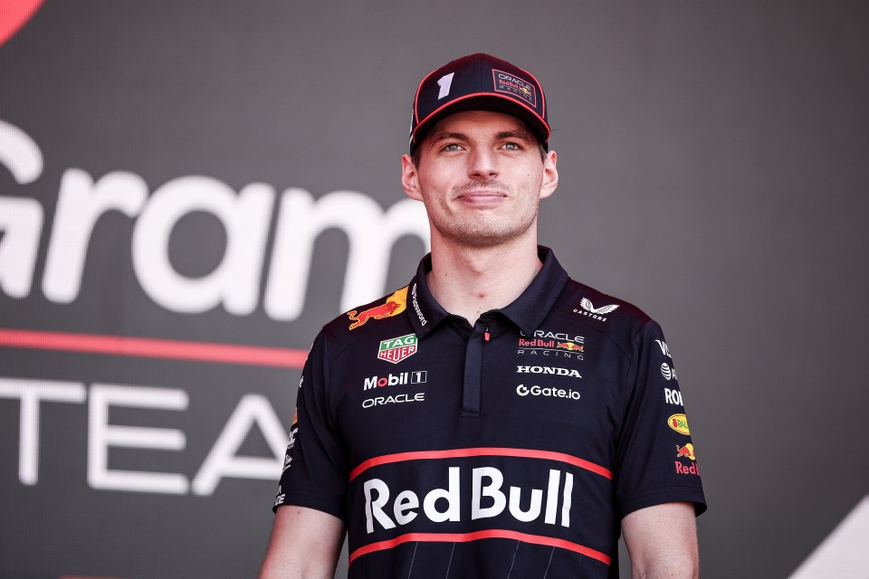 Max Verstappen in Red Bull Racing polo shirt.