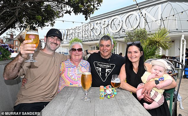 Fern Bushnell, 31, with her four-month-old son, her parents and partner Simon Griffiths, from Kettering, came to the seaside for the weekend