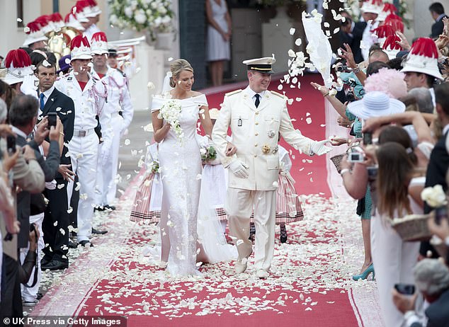 Albert and Charlene leave the Royal Palace as a newly married couple. Days before the big day, rumours began to circulate that Charlene had tried to flee the country on three occasions with a one-way ticket to Johannesburg