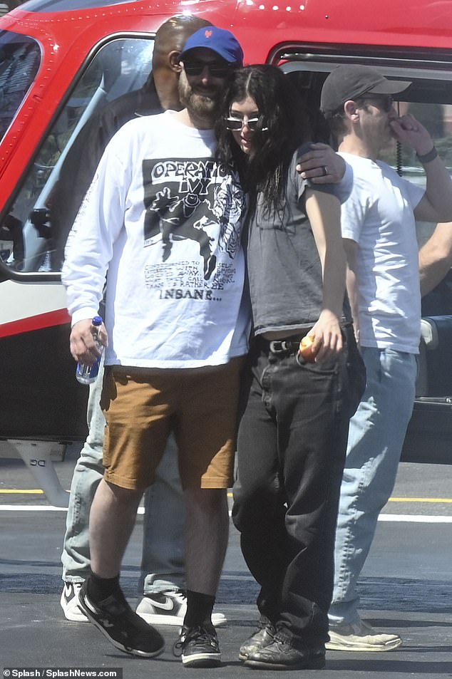 As she disembarked the helicopter, Lorde was also spotted larking around with another pal as the duo made their way off the tarmac
