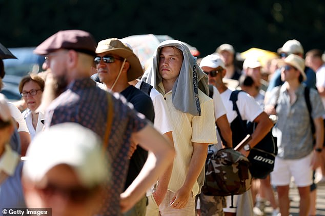 Fans faced a long wait to enter the grounds amid the record opening day temperatures yesterday