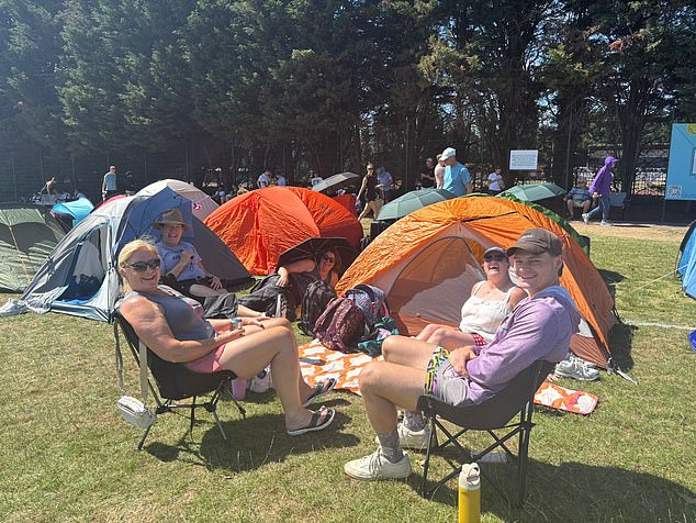 Aiden, Abigail and Mary McGovern and Alice and Maureen Curtis (pictured) pitched up their tent yesterday morning with hopes of making it in to today's games